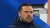 Chesterfield manager James Rowe (left) and coach Danny Webb (far right) on the touchline during the Emirates FA Cup third ro