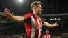 Nathan Collins celebrates scoring Brentford’s third goal (Jonathan Brady/PA)