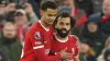 Cody Gakpo, left, hugs Mohamed Salah (Peter Byrne/PA)