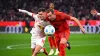 Harry Kane, right, vies for the ball against Leipzig’s Christoph Baumgartner (Tom Welle/dpa via AP)