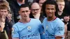 Phil Foden, left, and Nathan Ake are both out (Martin Rickett/PA)