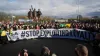 Manchester United fans protest against ticket pricing outside of Old Trafford (Martin Rickett/PA)