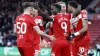 Emmanuel Latte Lath, centre, celebrates his goal with team-mates (Richard Sellers/PA)