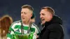 Celtic’s Callum McGregor (left) and manager Brendan Rodgers with the trophy after the Premier Sports Cup Final at Hampden Pa