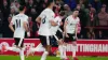 Diogo Jota, right, celebrates his equaliser with Kostas Tsimikas, second right (Mike Egerton/PA)