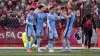 Dejan Kulusevski (second right) and Brennan Johnson (centre) scored in extra-time for Tottenham at Tamworth (Joe Giddens/PA)