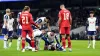 Rodrigo Bentancur is checked by team-mates after he suffered a suspected head injury during Tottenham’s 1-0 win over Liverpo